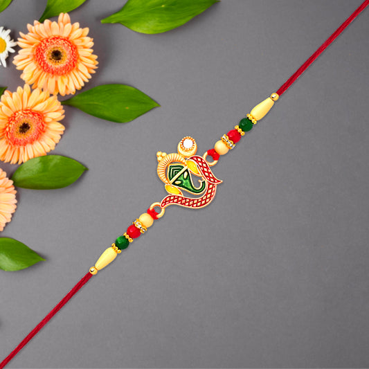 Green Enamel Lord Ganesha Rakhi With Decorative Red Thread And Golden Accents