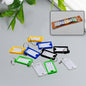 Set of 10 plastic key tags with key rings, numbered, includes backpack keychain.