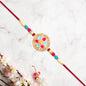Round Floral Rakhi With Pink-blue Enamel And Beaded Thread